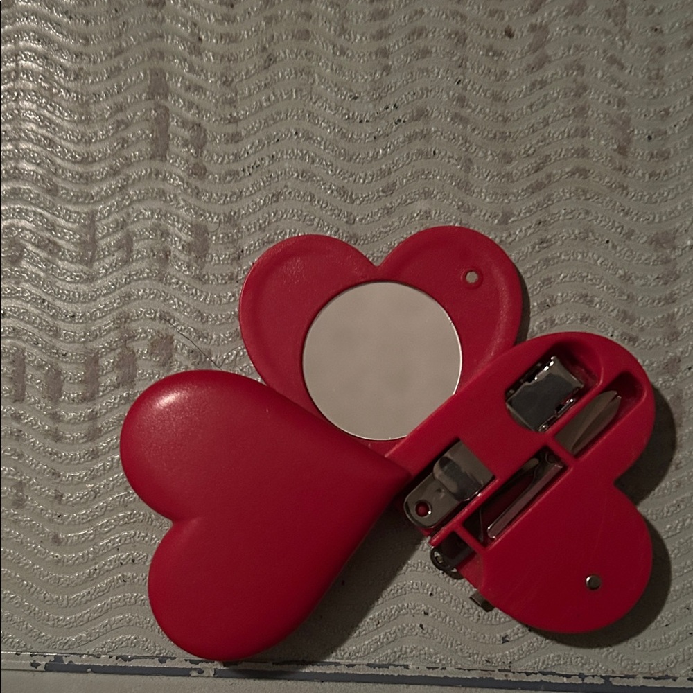 Red Heart-Shaped Compact Mirror with Nail Clippers